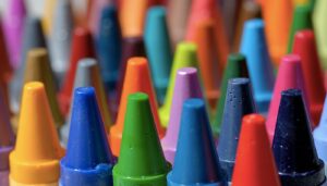 Picture of crayons of all colors waiting to color your new Pokemon coloring book!